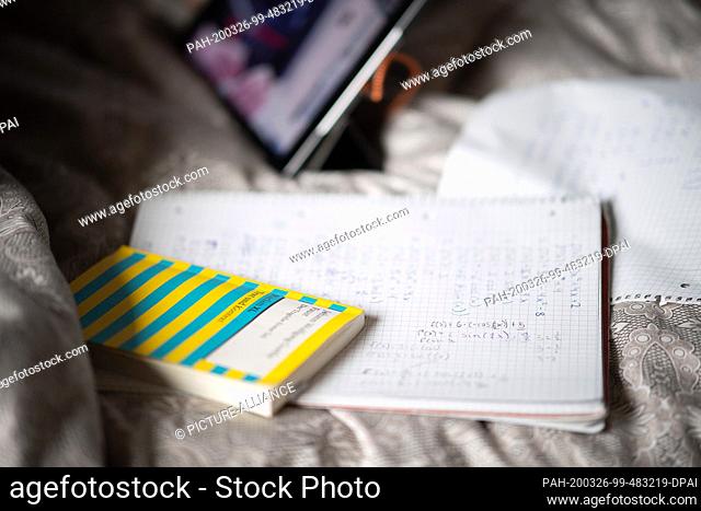 26 March 2020, Baden-Wuerttemberg, Waldenbuch: A copy of the high school graduation book ""Faust"" is lying on the bed of a student who works for the school