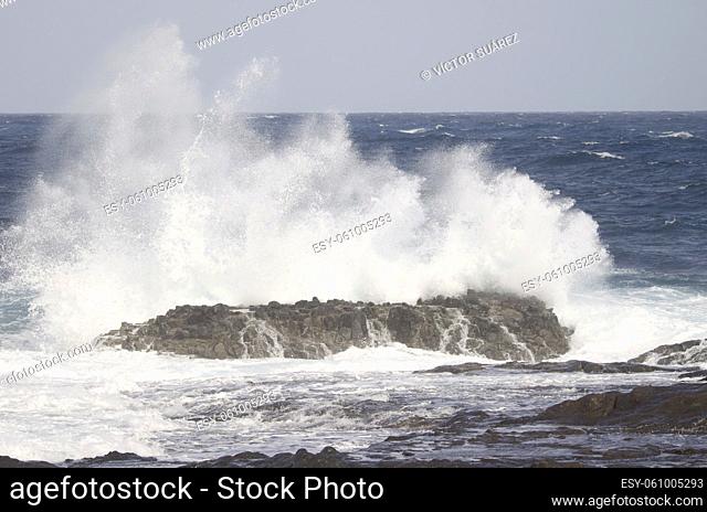 Wave breaking against the shore. El Confital. La Isleta Protected Landscape. Las Palmas de Gran Canaria. Gran Canaria. Canary Islands. Spain