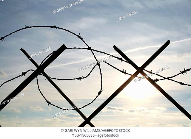 barbed wire defence barrier outdoors by sea in italy