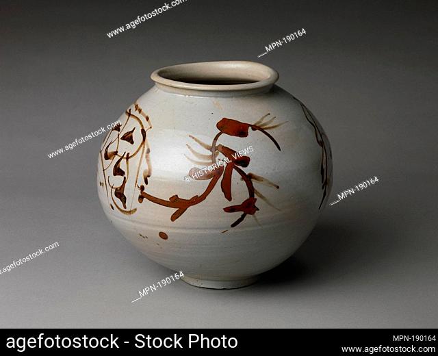 Jar decorated with dragons. Period: Joseon dynasty (1392-1910); Date: 17th century; Culture: Korea; Medium: Porcelain with underglaze iron-brown painting;...