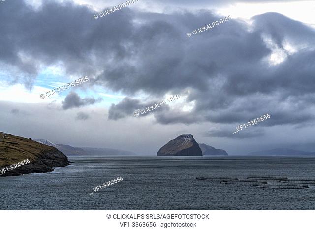 Stormy sky on Koltur island seen from Sandavagur, Vagar island, Faroe Islands, Denmark