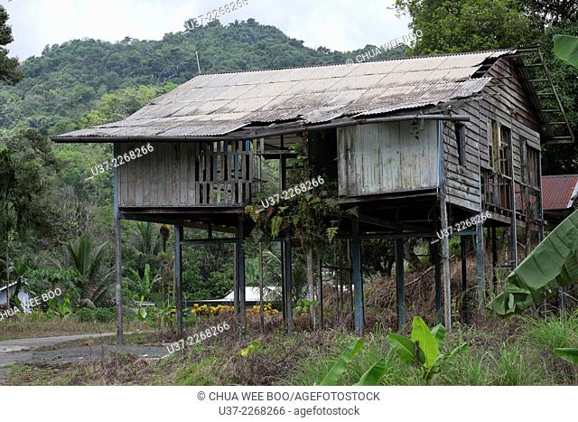 An abandoned wooden Bidayuh house in Kampung Bengoh, Sarawak, Malaysia
