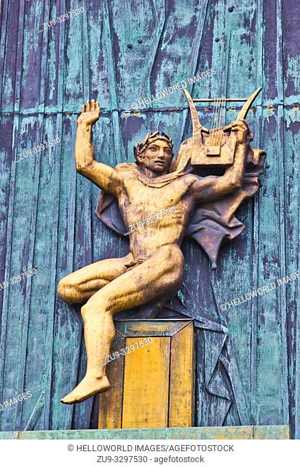 Façade relief bronze of Apollo, Staerekassen, Royal Danish Theatre, Copenhagen, Denmark, Scandinavia Staerekassen (meaning literally starling nest box) so named...