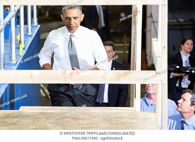 President Barack Obama tours Ellicott Dredges, a manufacturer of dredging equipment in Baltimore, Maryland to highlight American manufacturing on May 17, 2013