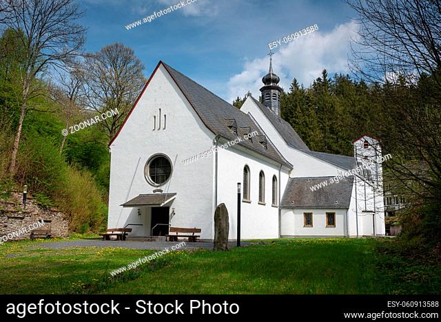 Panoramic image of the pilgrimage church of monastery Maria Martental close to Cochem on a sunny day, Germany