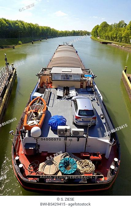 barge leaving the lock Bevergern, Dortmund Ems Canal, Germany, North Rhine-Westphalia, Muensterland, Hoerstel