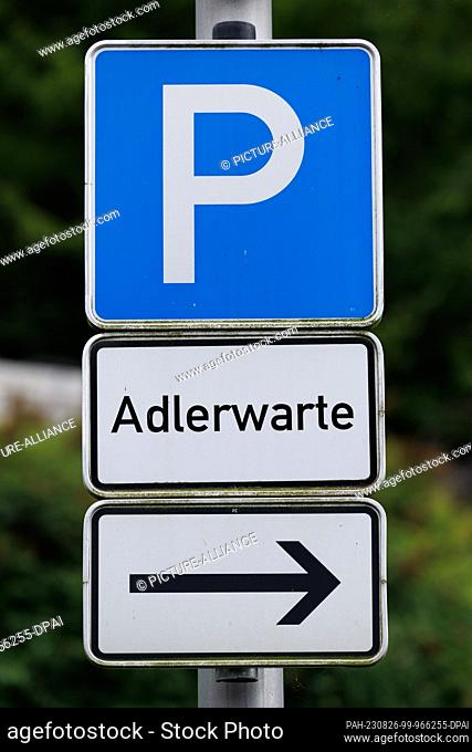 16 August 2023, North Rhine-Westphalia, Detmold: ""Adlerwarte"" is written on a sign in the parking lot in front of the grounds of the Adlerwarte Berlebeck