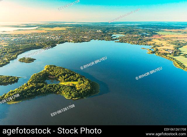 Lyepyel, Lepel Lake, Beloozerny District, Vitebsk Region. Aerial View Of Island Pension Lode In Autumn Morning. Morning Fog Above Lepel Lake