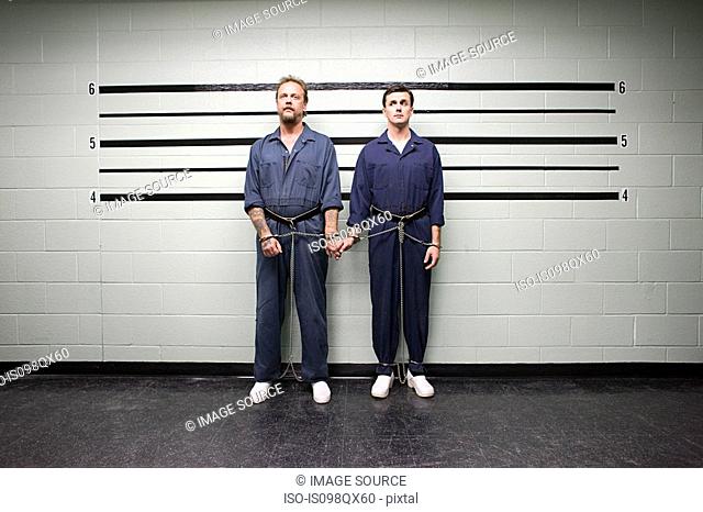 Prisoners holding hands