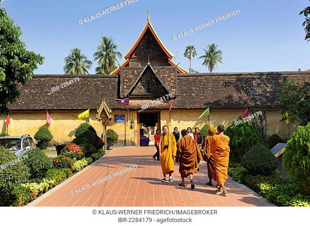 Buddhist monks at Wat Si Saket, also known as Wat Satasahatsaham, a Buddhist temple in Vientiane, Laos, Southeast Asia, Asia