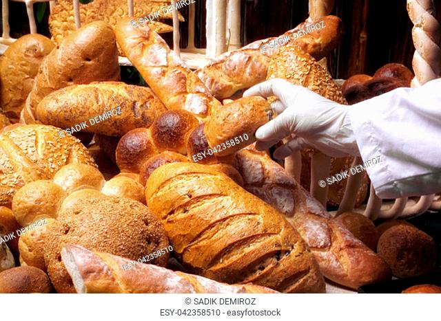 an image of variety of breads and chief