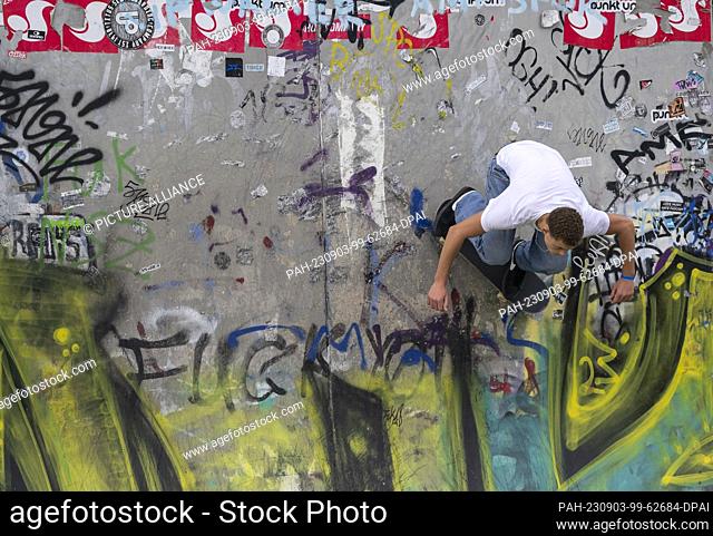 03 September 2023, Saxony, Dresden: A participant performs during a competition run at the 26th East German Skateboarding Championships