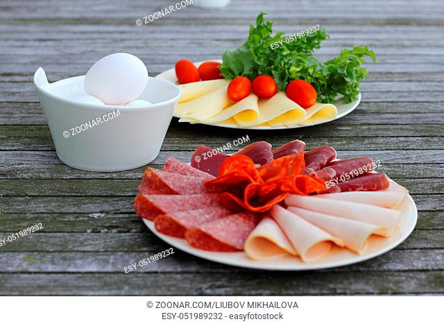Healthy breakfast with cold cuts and eggs, scandinavian style