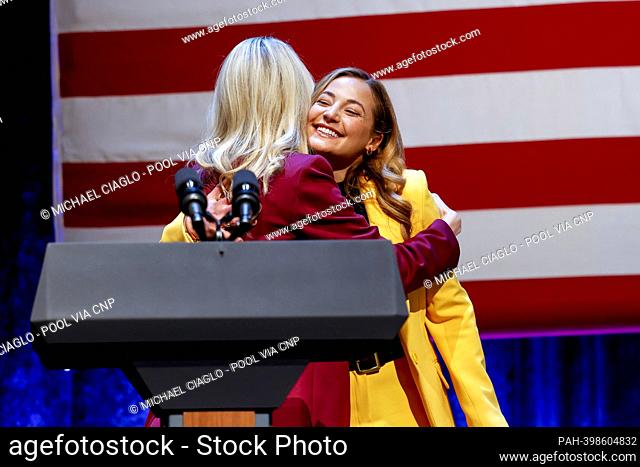 United States Representative Brittany Pettersen (Democrat of Colorado), left, hugs Sasha DiGiulian, a professional rock climber