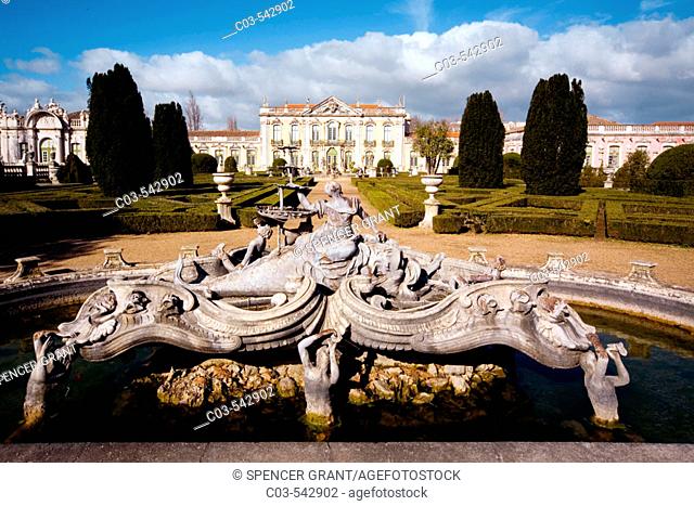 Queluz, Portugal: Ornate fountain with mythic figures and pool in the formal gardens of the Palacio Nacional de Queluz. The Queluz Palace