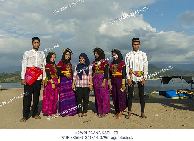 Group photo of young Bajau dancers, at Bungin Island, off the coast of Sumbawa Island, Indonesia, home to a group of Bajau Sea Gypsies