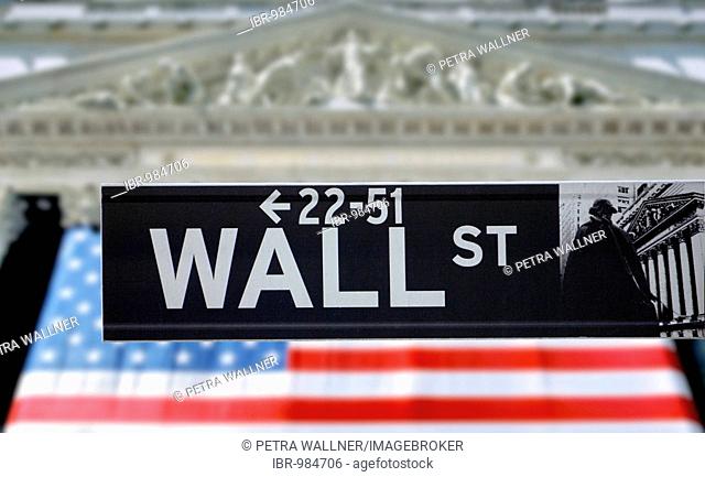 Wall Street, street sign in front of New York Stock Exchange with an American flag, Financial District, Manhattan, New York City, NYC, New York