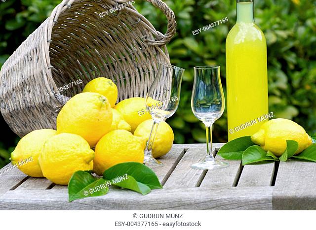 Basket with lemons and limoncello