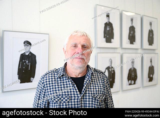 26 April 2022, Saxony, Hoyerswerda: Photographer Frank Höhler, stands in the exhibition ""Schicht. Umbrüche im Revier"" at the Knappenrode energy factory in...