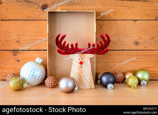 A typical Christmas symbols decoration on a wooden background