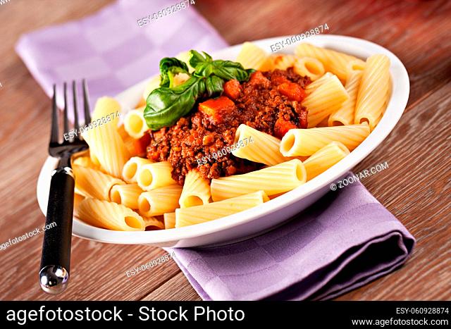 Macaroni Bolognese on a plate. Typical Italian dish. High quality photo
