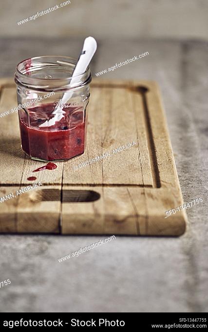 Rhubarb and wild berry jam in a jar