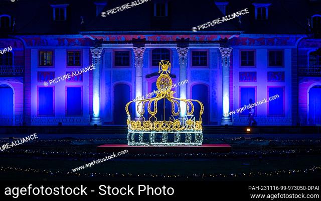 16 November 2023, Saxony, Dresden: A crown, the pleasure garden and the water palace are illuminated for the opening of the ""Christmas Garden"" light show in...