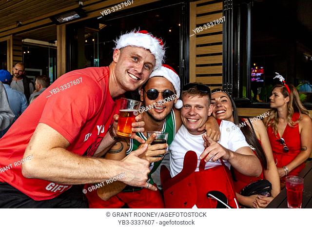 A Group Of Young People Celebrating Christmas, Whangarei, North Island, New Zealand
