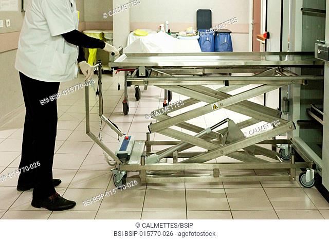 A dead body (corpse) is just arrived in the mortuary chamber in an hospital, PACA, FRANCE