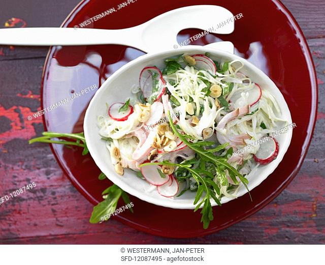 Cabbage salad with radishes, hazelnut and smoked pork chops