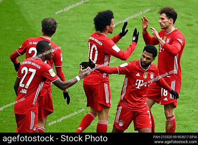 20 March 2021, Bavaria, Munich: Football: Bundesliga, FC Bayern München - VfB Stuttgart, Matchday 26 at Allianz Arena. Munich midfielder Serge Gnabry (2nd from...