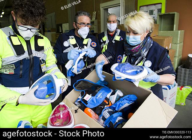 The Civil Protection of Concorezzo during the collection of diving masks EasyBreath that modified will serve hospitals as respirators for Covid-19