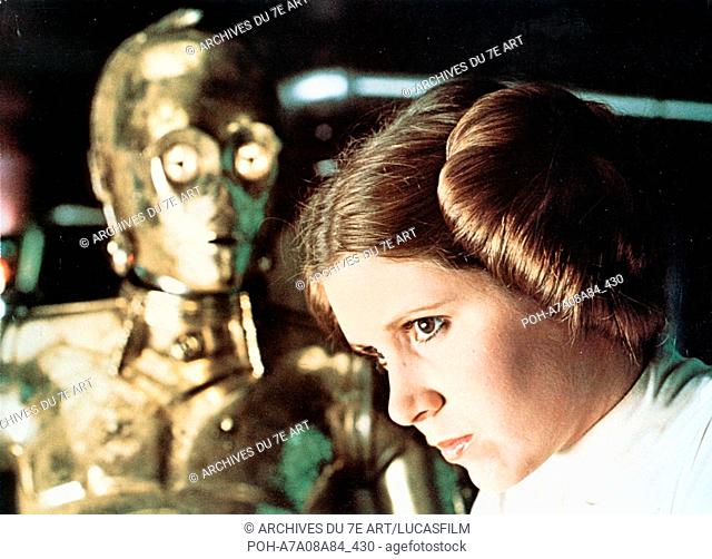 Star Wars: Episode IV - A New Hope Year: 1977 USA Director: George Lucas Carrie Fisher, Anthony Daniels. It is forbidden to reproduce the photograph out of...