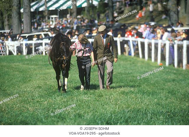 Walker with horse during Spring Steeplechase race, Glenwood Park, Middleburg, Virginia