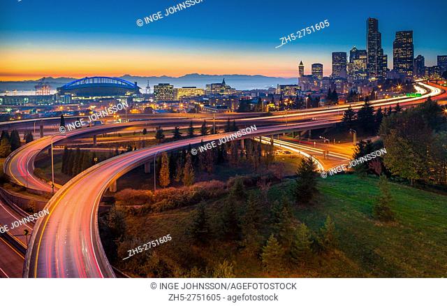 Freeways leading to downtown Seattle at sunset