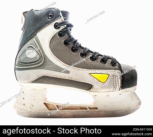 Man's hockey skate isolated on white background. Close up details and texture of this scuffed up old skate