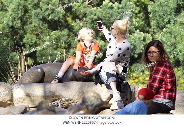 Gwen Stefani and kids playing in the park in Beverly Hills Featuring: Gwen Stefani, Zuma, Apollo Where: Los Angeles, California