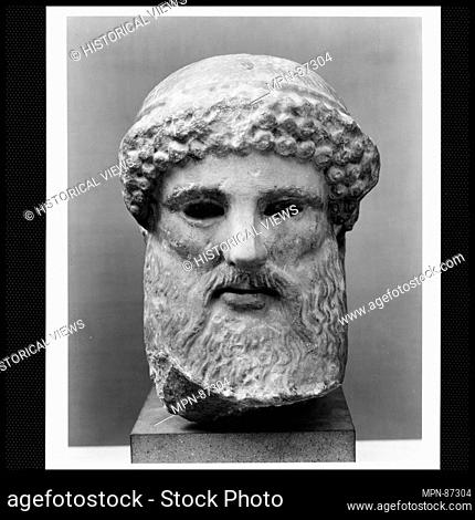 Marble head of a herm. Period: Early or Mid Imperial; Date: 1st or 2nd century A.D; Culture: Roman; Medium: Marble; Dimensions: Overall: 14 1/2 x 8 1/2 x 10in