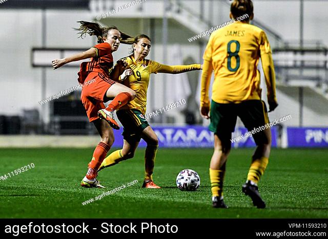 Belgium's Sari Kees and Kayleigh Green of Wales fight for the ball during the match Belgium vs Wales, second match of Belgium's national women's soccer team the...