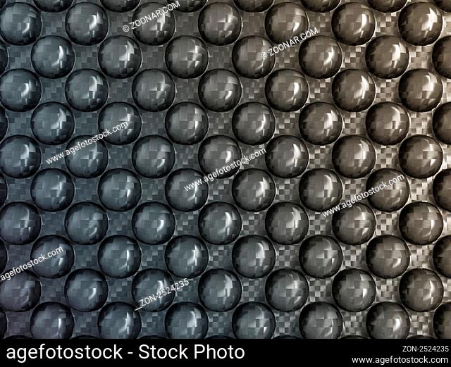 Abstract Carbon fiber with pimples. Useful as background