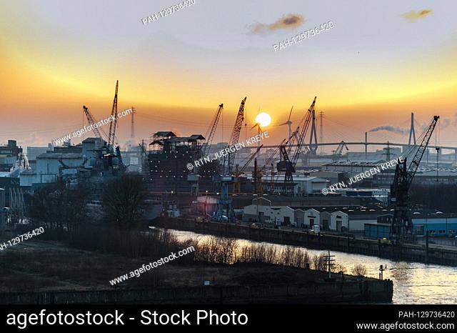 Landscape - City view of Hamburg - Hamburg harbor, sunset, view of the Kohlbrandbrucke Elbphilharmonie, Elphi, visitor plaza on January 14th