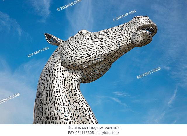 Falkirk, Scotland - May 19, 2018: Kelpies, famous sculptures of horse heads, public art by Andy Scott in Helix park near Falkirk