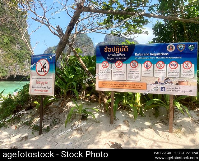 PRODUCTION - 12 March 2022, Thailand, Ko Phi Phi Leh: Signs read the new rules after the reopening of Maya Bay. The rules for visiting the dream beach in...