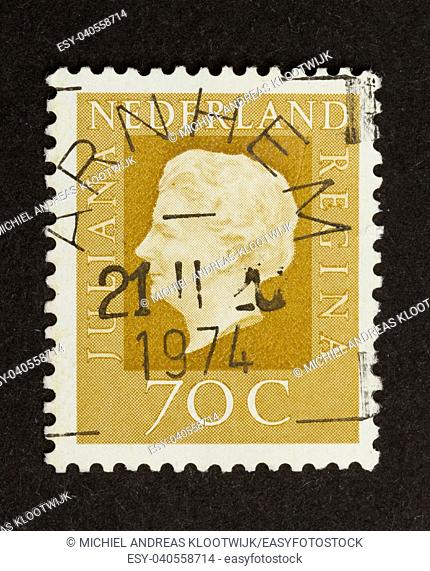 HOLLAND - CIRCA 1970: Stamp printed in the Netherlands shows the queen (Juliana), circa 1970