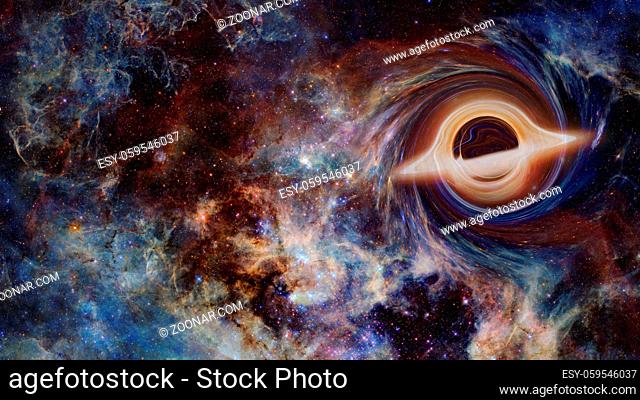 Simulation of a big black hole in the dark space. Elements of this image furnished by NASA