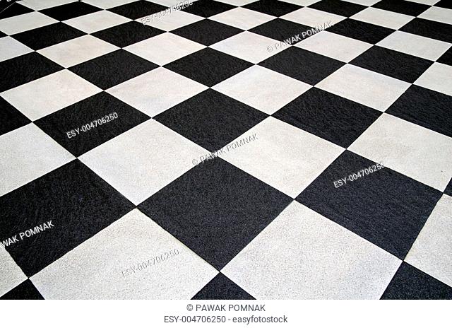 Square black and white tiles floor