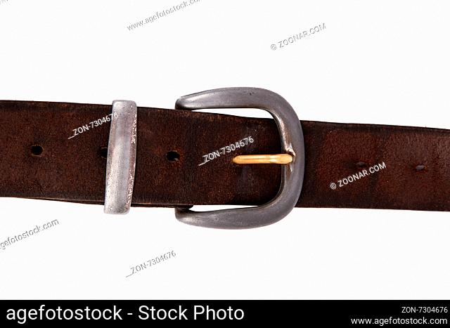 Close up detailed front view of brown tighten leather belt with buckle, isolated on white background
