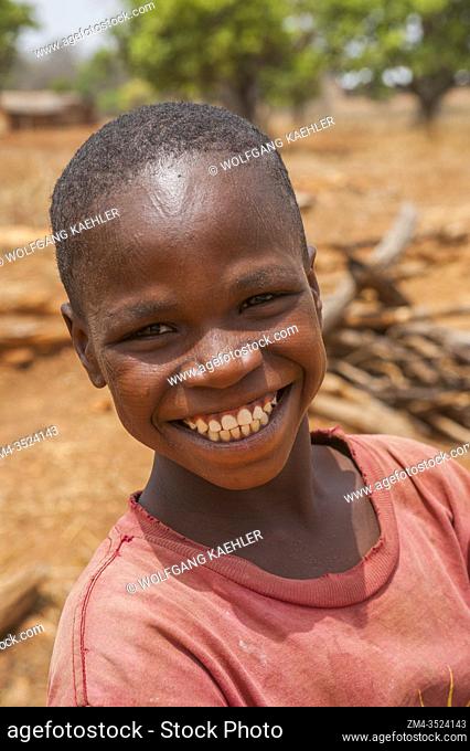 Portrait of a boy in Somba Land, Benin, with scarification, which is applied on the face when they are children and is an initiation and entry into the...