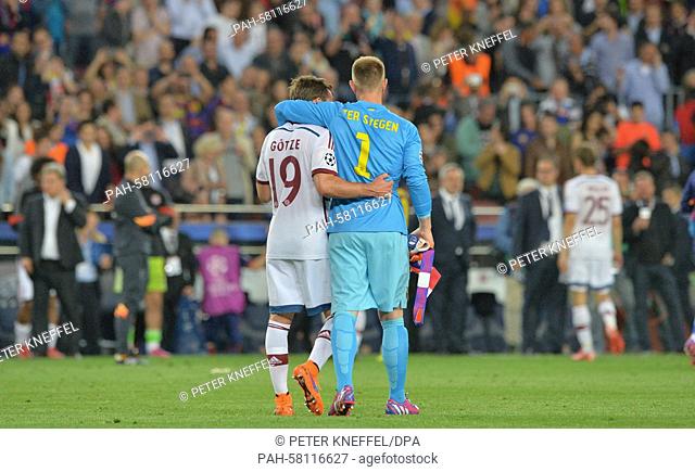 Barcelona's Marc-Andre ter Stegen (R) and Munich's Mario Goetze embrace each other after the UEFA Champions League semi-final first leg soccer match betweeen...