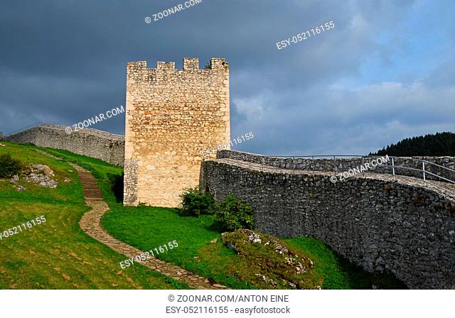 Tower and wall of Spissky hrad or Spis Castle ruins in Slovakia, one of the largest castle sites in Central Europe, built in 12th century